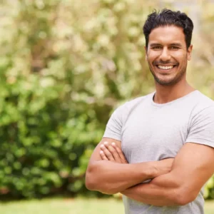 man smiling after losing weight